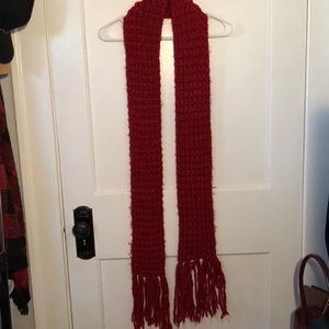 Knitted long red scarf with sparkles